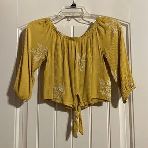 Off the shoulder top with 3/4 length sleeves.